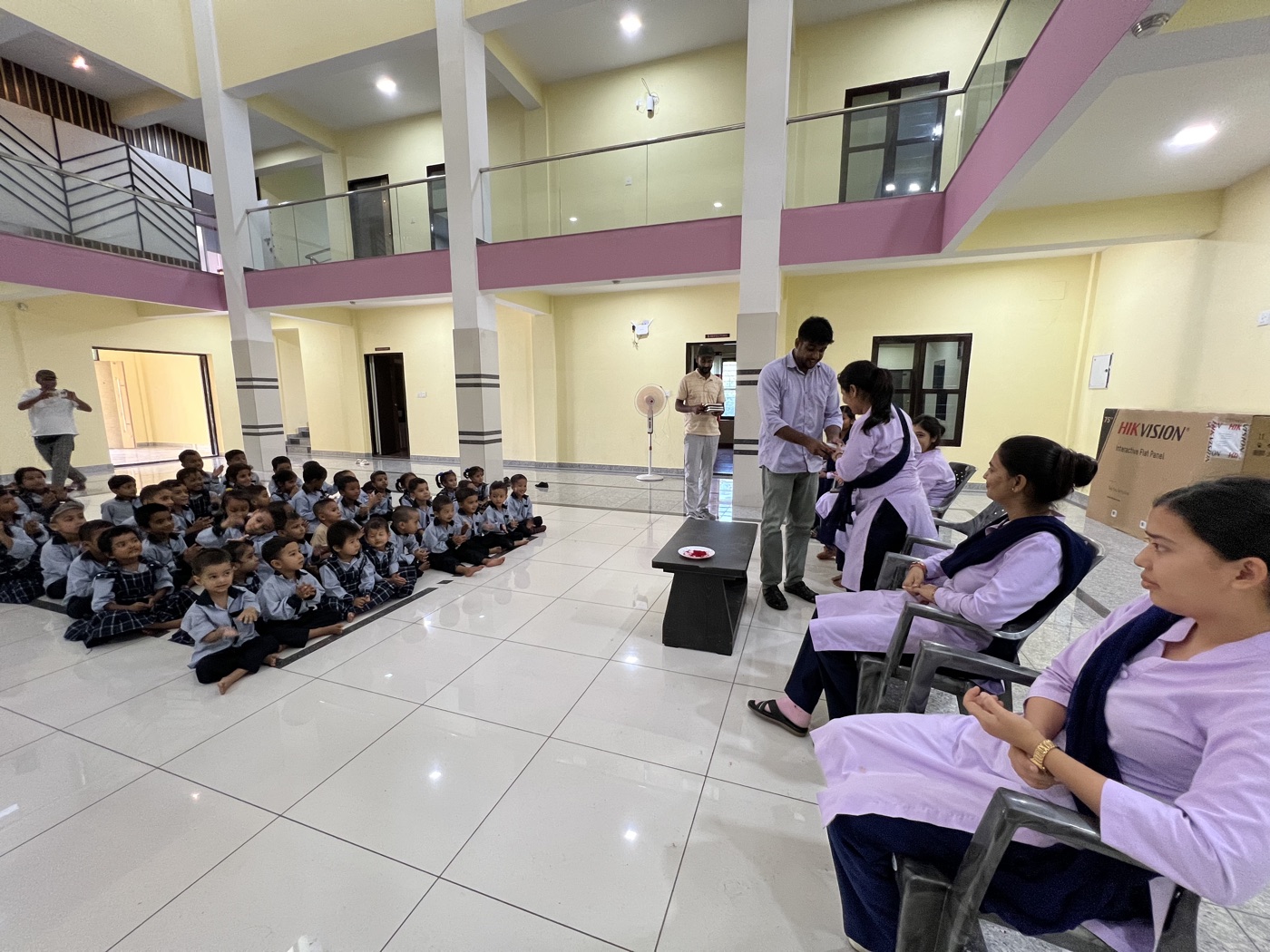 Indoor Assembly in Modern Campus Atrium